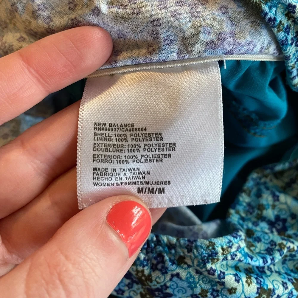 New Balance women’s turquoise blue floral athletic running shorts size medium